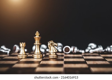 Close Up King Chess Stand With Falling Chess Concept Of Team Player Or Business Team And Leadership Strategy Or Strategic Planning And Human Resources Organization Risk Management.