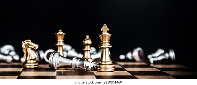 Close Up King Chess Stand Pieces With Falling Chess Concept Of Team Player Or Business Team And Leadership Strategy Or Strategic Planning And Human Resources Organization Risk Management.