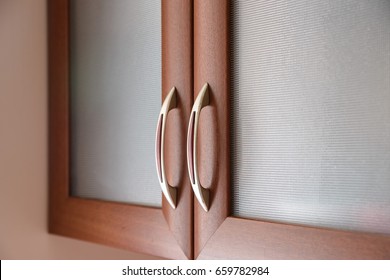 Close Up Of Kitchen Cabinet Door Handles