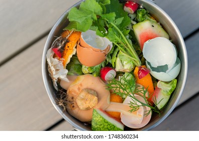 Close Up Of Kitchen Counter Compost Bin With Food Scraps 