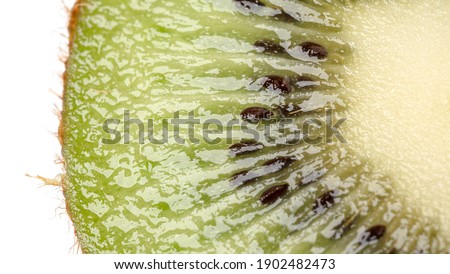 Close up of kiwi and kiwi slice isolated on white background. macro