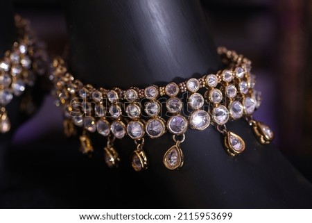 close up of  kundan studded leg chain also called as golusu in Indian tradition