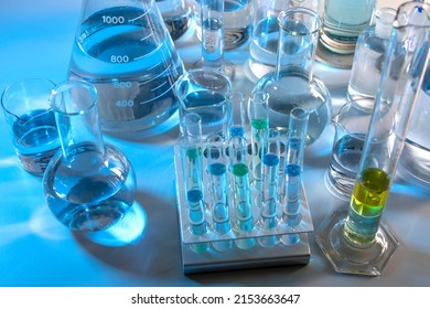 Close up of labware such as beaker, flask, graduated cylinders and test tubes well placed