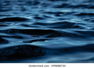 
Close Up Of Lake Waves In A Narrow Depth Of Field. Strong Shadows, Light Harmony And Serenity In A Simple Image. Captured With Fast Shutter Speeds.