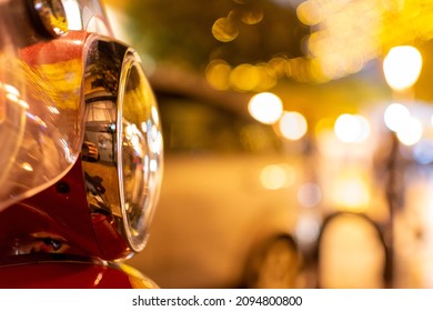 Close Up of a Lamp of Motorcycle in Winter on Blurred Background