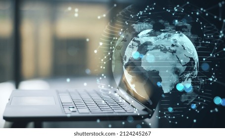 Close Up Of Laptop Computer With Glowing Money Transfer Globe On Blurry Background. Currency And Stock Exchange Concept. Double Exposure