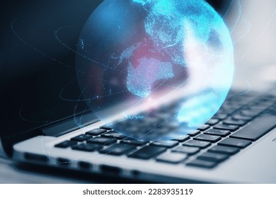 Close up of laptop with glowing globe and connection lines on office desktop. Digital world and technology concept. 3D Rendering