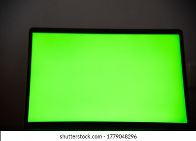 Close Up Laptop With Green Screen In Background Concept.