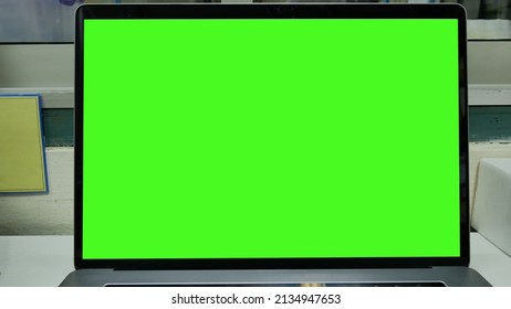 Close Up Laptop Green Screen On White Background.