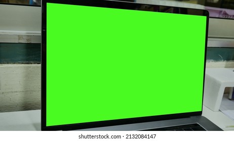 Close Up Laptop Green Screen Technology Concept.