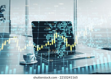 Close Up Of Laptop On Desktop With Coffee Cup And Creative Forex Chart, Candlestick Graph, Index And Tech Hologram On Blurry Background. Trade, Stock, And Finance Concept. Double Exposure