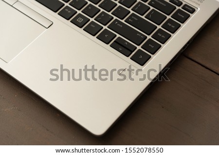 Close up laptop on wooden table