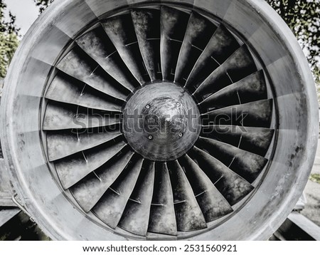 Close up of a large jet or airplane engine turbine blades. Old engine