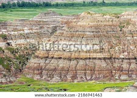Close up of layers rock strata in the Alberta Badlands of Dinosaur Provincial Park, Drumheller, Canada.