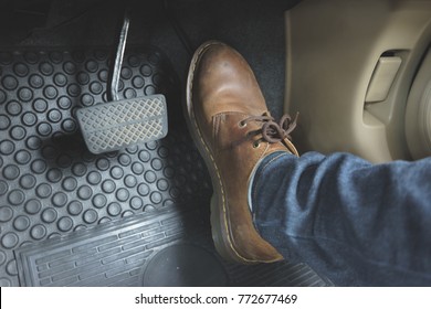 Close Up Leather Shoe On Pedal In Car