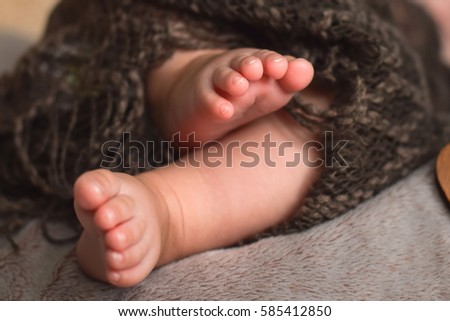 close up of a leg of the beloved child
