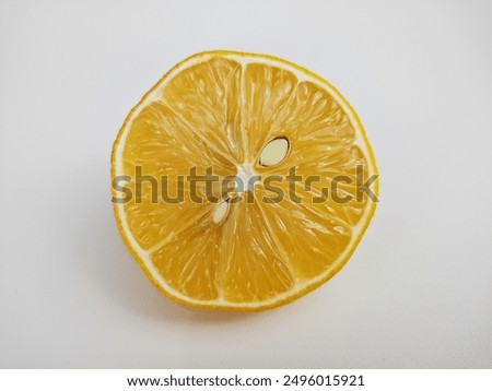 close up of lemon slice on isolated white background