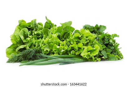 Close up of lettuce, spring onions and green vegetables, isolated on white. Concept of healthy lifestyle and dieting
