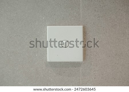 Close up of light switch with copy space to the front view. Wall light switch in the on or off position. Front view.