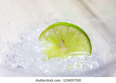 Close up of lime slice with ice 