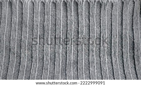 Close up Linear line details of Knitted Woolen, Knitwear Fabric Texture, Warm Clothes for Fall and Winter, Woven, Sweaters, grey color