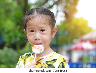 Funny Face Asian Little Girl Lollipop Stock Photo (Edit Now) 712744090