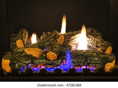 Close Up Of Logs In Gas Fireplace