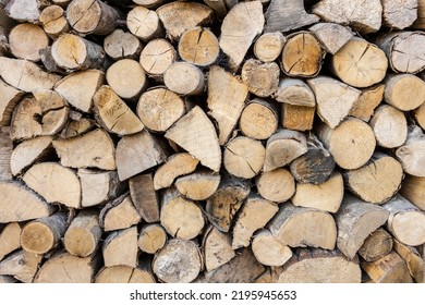 close up of logs stored to dry for use in a log burner