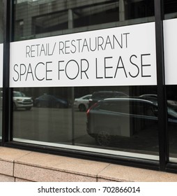 Close Up Look At A Retail/Restaurant Space For Lease Sign In A Major US City.