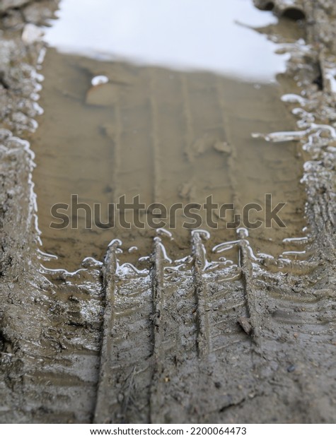 Close up of lorry\
tire track with mud water
