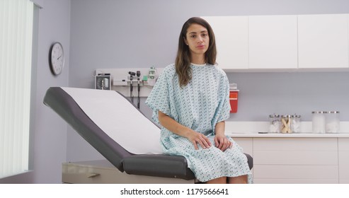 Close up of lovely latina woman seated on medical chair in hospital clinic - Powered by Shutterstock