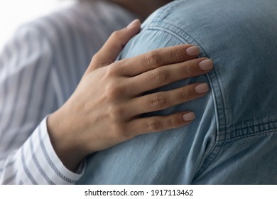 Close Up Of Loving Millennial Woman Hand Embrace Shoulder Of Beloved Man. Happy Young Married Couple Dancing Slow Dance Together With Romantic Music. Caring Wife Support Comfort Encourage Dear Husband