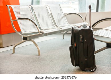 Close Up Of Luggage (suitcase, Baggage) Near Chairs At The Airport. Indoor. Travel (vacation), Business Concept. Copy Space. Place For Your Text (message).