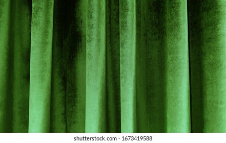 Close Up Of Luxury Dark Green Velvet Curtain. Abstract Background.