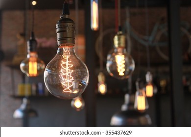 Close up of luxury round light bulbs in a vintage living room. - Powered by Shutterstock