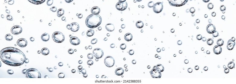 Close up macro Aloe vera gel cosmetic texture white background with bubbles. Lemongrass gel skincare product. antibacterial liquid with aloe vera, moisturizing. Serum texture. Hand sanitizer