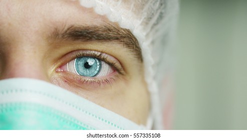 Close Up Or Macro Of An Eye Of A Doctor, Surgeon. Futuristic And Technological Vision Of Medical Care And Patient Protection. Futuristic Medicine, Technology Eye, Medical Holography, Future