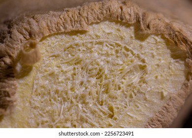 Close up or macro photo of a ginger fruit core or meat and crust. Cut away view of ginger core taken with big macro lens. - Shutterstock ID 2256723491
