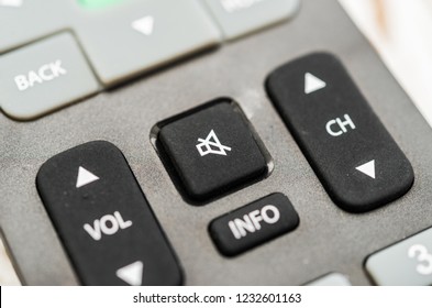 Close Up Macro Photography Of A Smart Tv Television Remote Control With Volume Button. Concept Of Silence, Fake News, And Propaganda