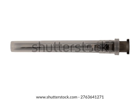 Close up macro view of hypodermic needle featuring safety cover