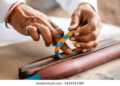 Close up of making handmade Indian bangle