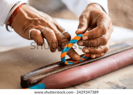 Close up of making handmade Indian bangle