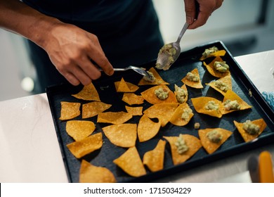 Close Up Of Making Nachos In Social Event