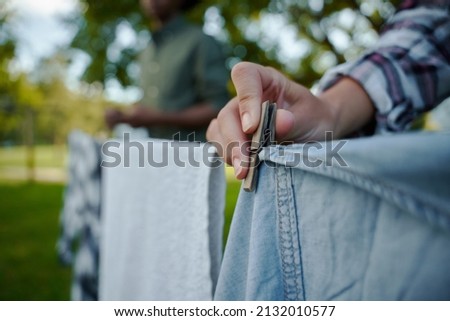 Similar – Image, Stock Photo Clothespins hanging on the line