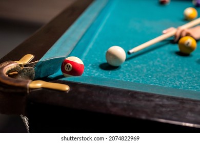 close up of male or female hand taking the shot at pool. game concept - Shutterstock ID 2074822969