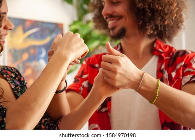 Close up of male and female hands while salsa dancing.  - Powered by Shutterstock