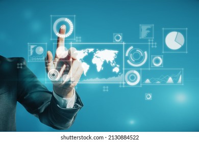 Close up of male hand pointing at abstract digital business interface on blurry blue background. Technology, finance, success, economy and growth concept. Double exposure