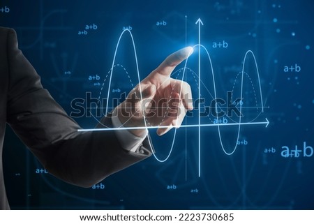Close up of male hand pointing at abstract glowing mathematical formula graph on blue background. Equation, digital data and mathematics app concept