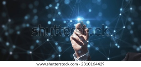 Close up of male hand pointing at creative glowing blurry plexus on dark background. Digital communication and network concept