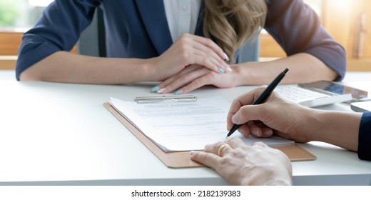 Close Up Of Male Hand Putting Signature, Running Own Small Business, Have A Contract In Place To Protect It, Basics Of Writing Contract, One Sentence In A Contract Can Cost A Business.
